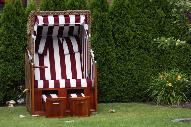 roofed wicker beach chair